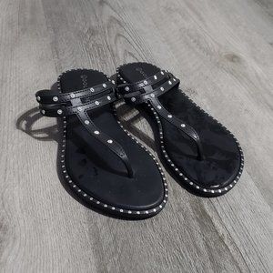Gold Toe black rhinestone studded flip flops